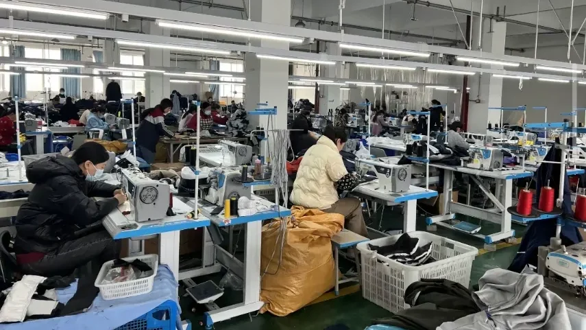 Down jacket production line in a professional apparel factory